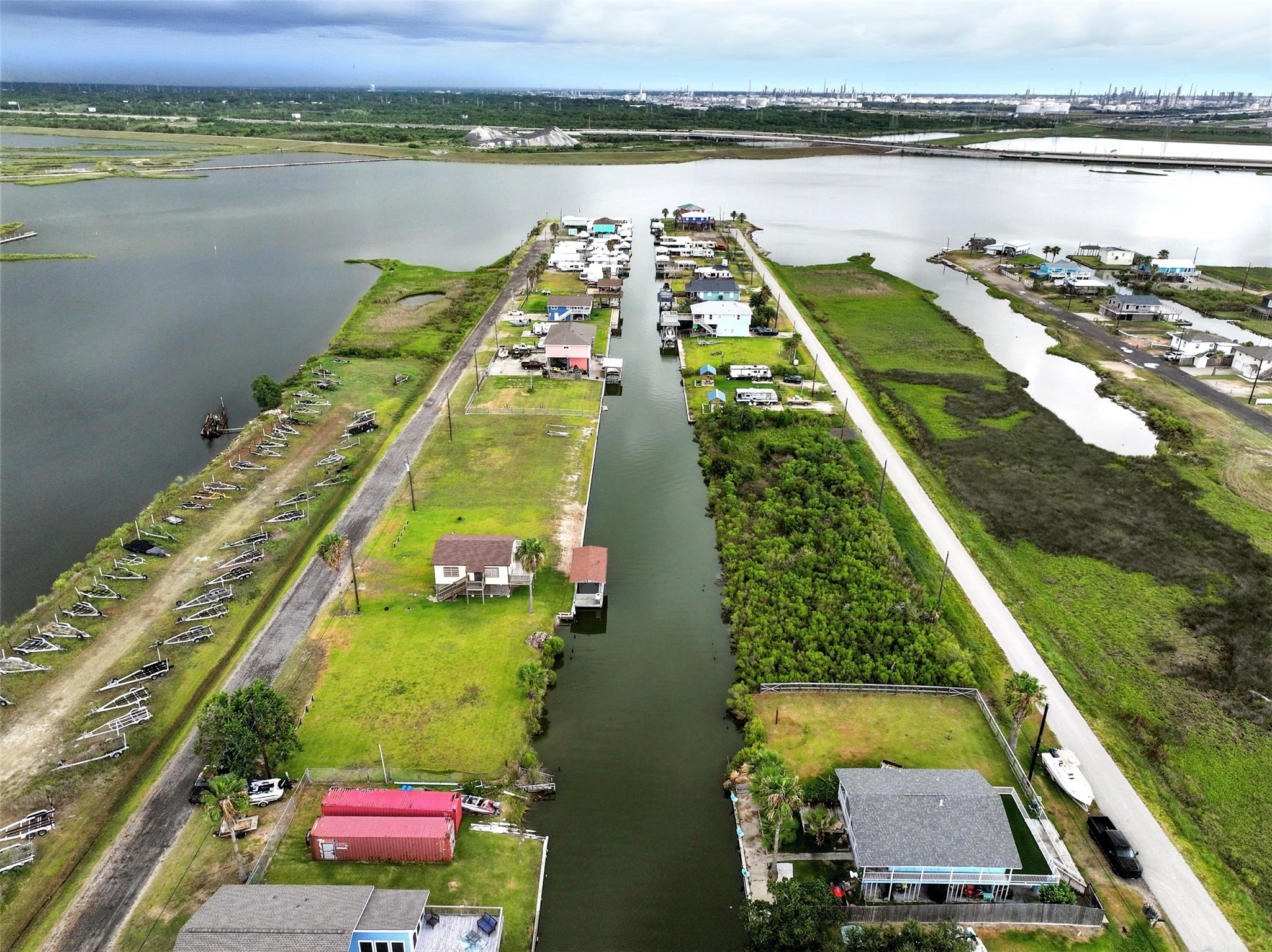 aeiral view showing the canal that leads to the larger water connected to the bay