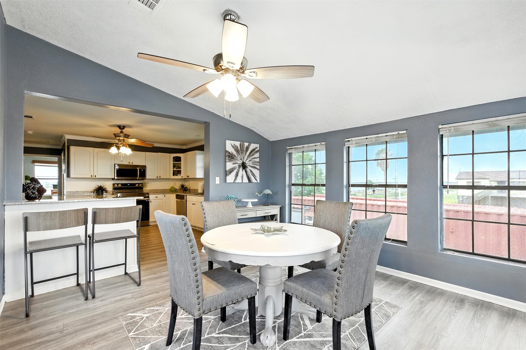 dining room has windows on all sides with waterviews.  Small bar allows extra seating
