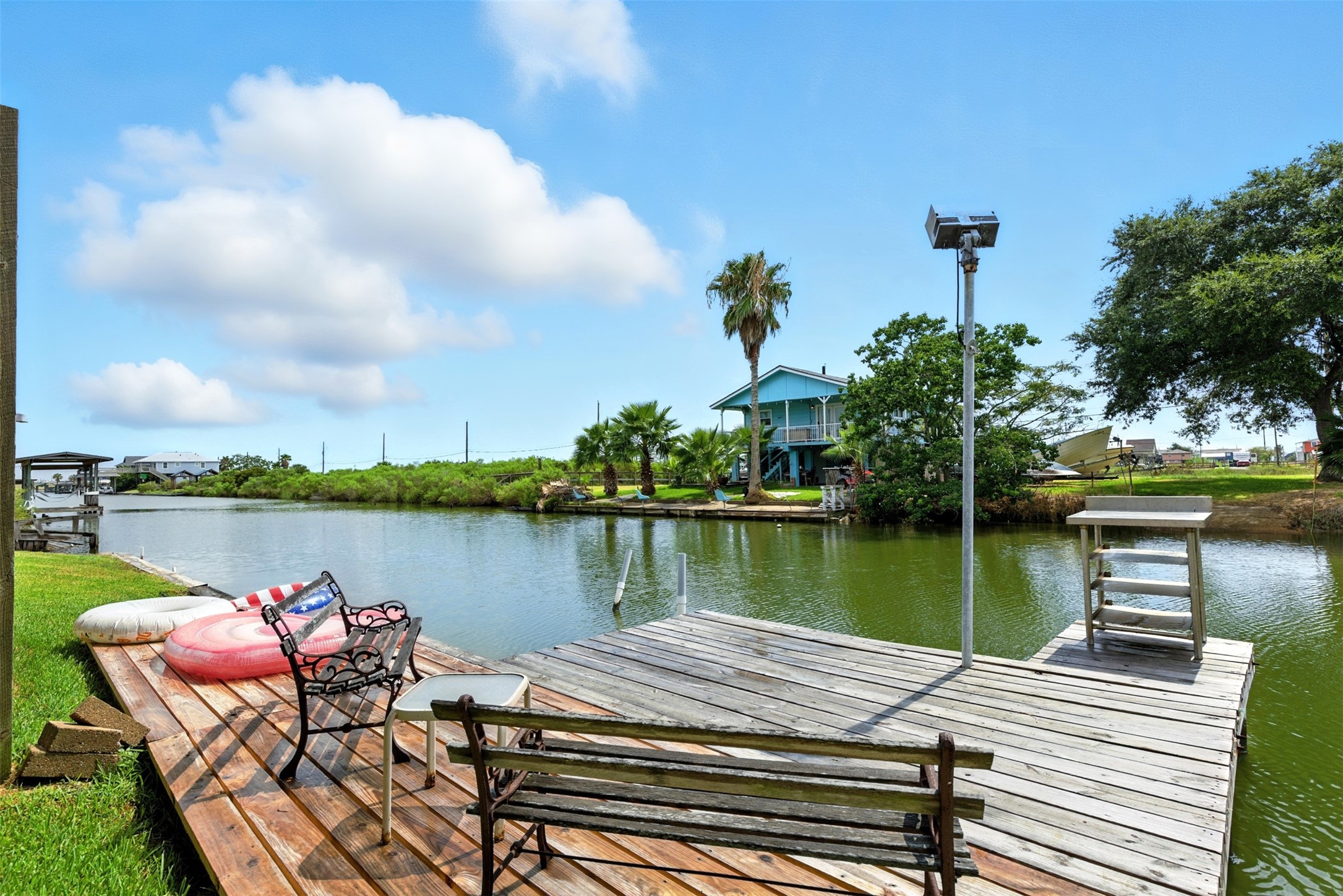 private dock and canal access, fish cleaning station included
