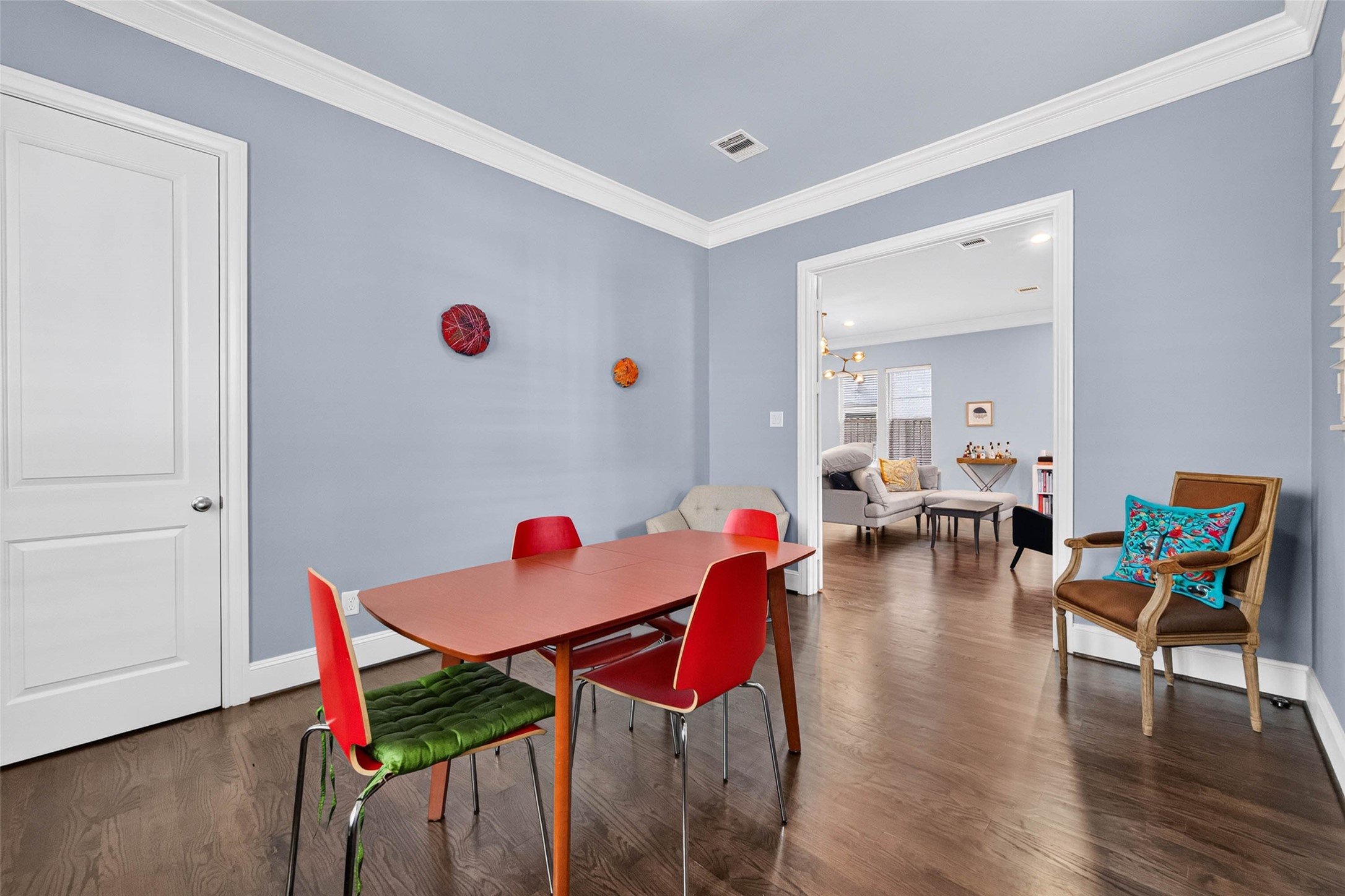 A versatile room just off the living area, currently used as a dining room but easily adaptable to a home office, guest room, or additional flex space. A sizable closet provides convenient extra storage.