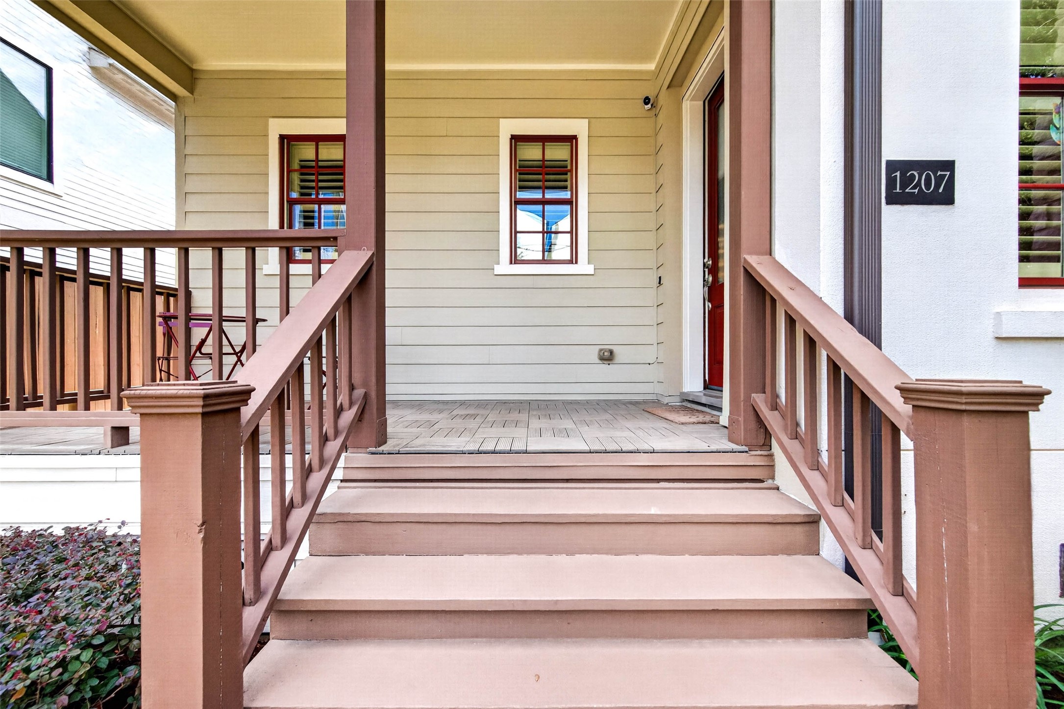 An inviting front porch with plenty of room to sit back, relax, and enjoy the charm of the neighborhood. A welcoming extension of the home that makes the perfect spot for morning coffee or unwinding at the end of the day.