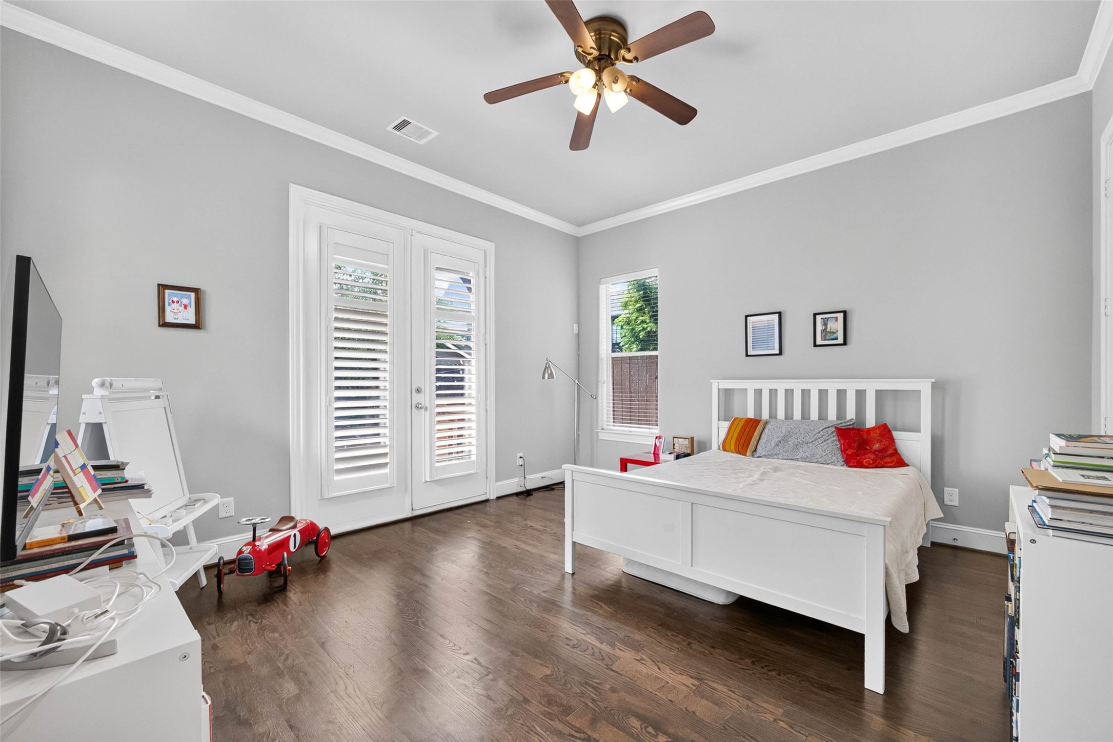 Another angle of this generously sized bedroom.