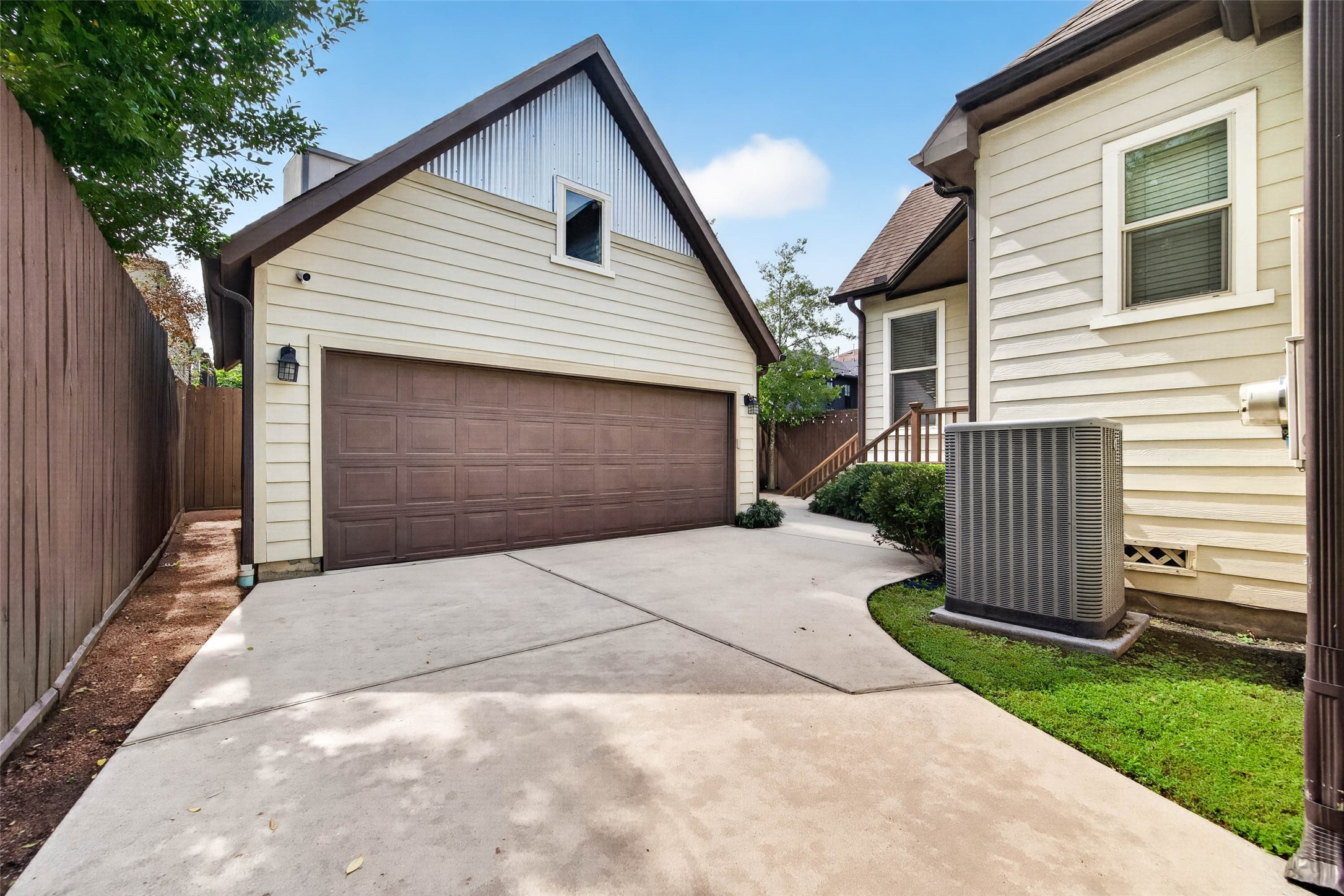 Additional potential awaits above the detached garage, with the opportunity to build out for extra storage or create a versatile flex space.