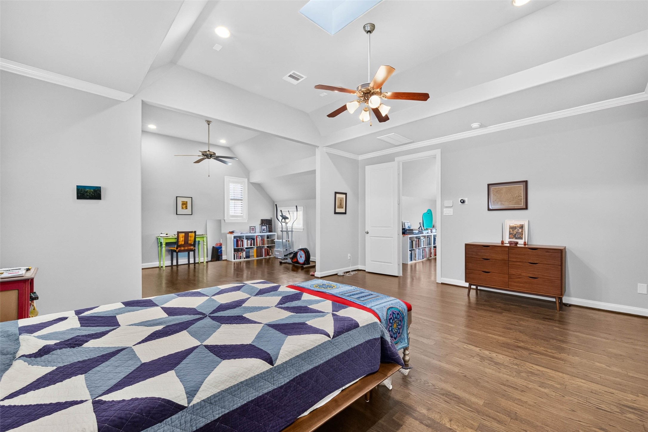 Just off the bedroom, a spacious sitting area offers the perfect spot for a cozy reading nook, private lounge, or additional flex space.