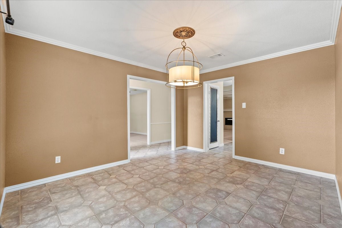 Bright and spacious, this dining area is perfect for dinner parties, holiday gatherings, and special occasions. The open, airy floor plan easily accommodates a substantial dining table, and ideal setting for entertaining.