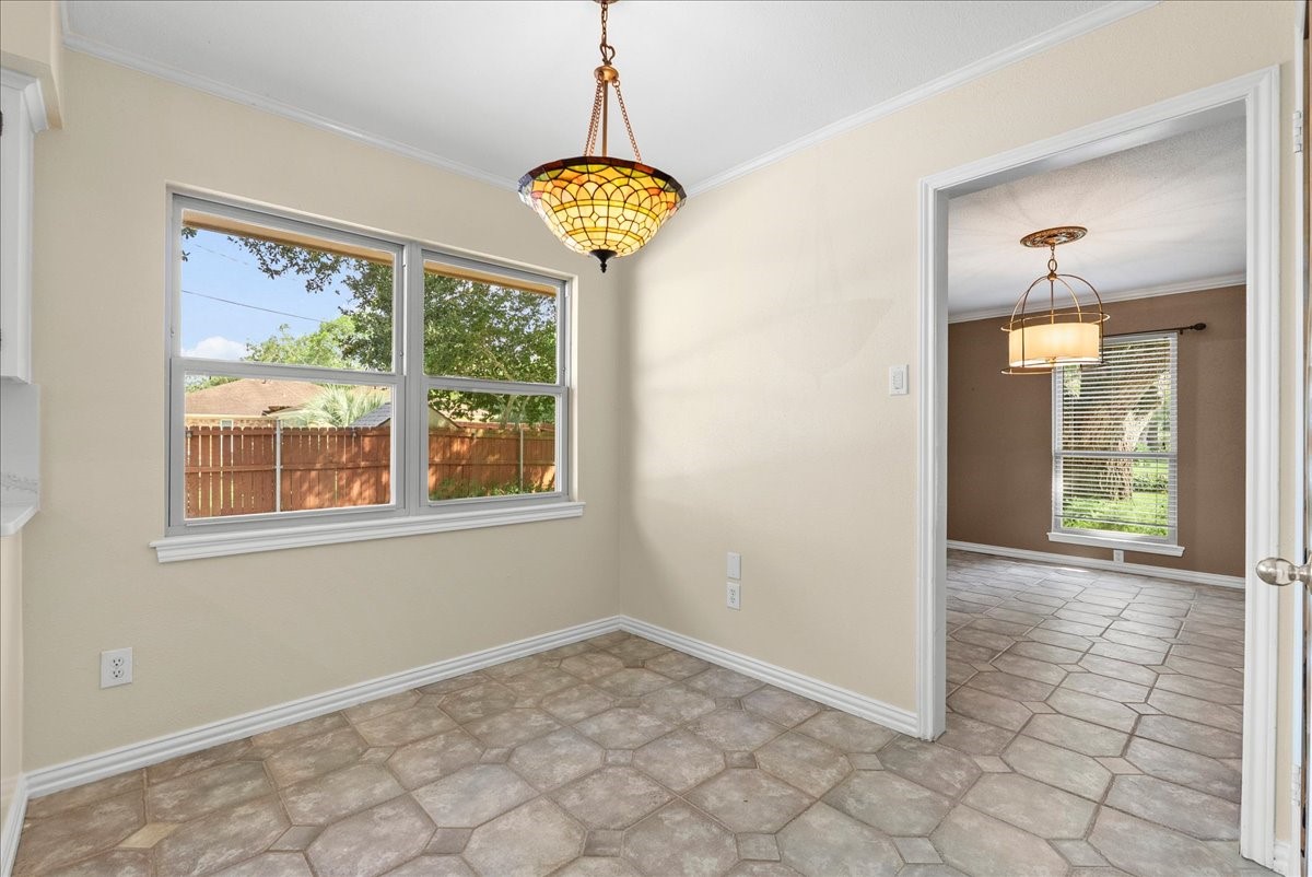 Spacious formal dining room perfect for entertaining friends and family.
