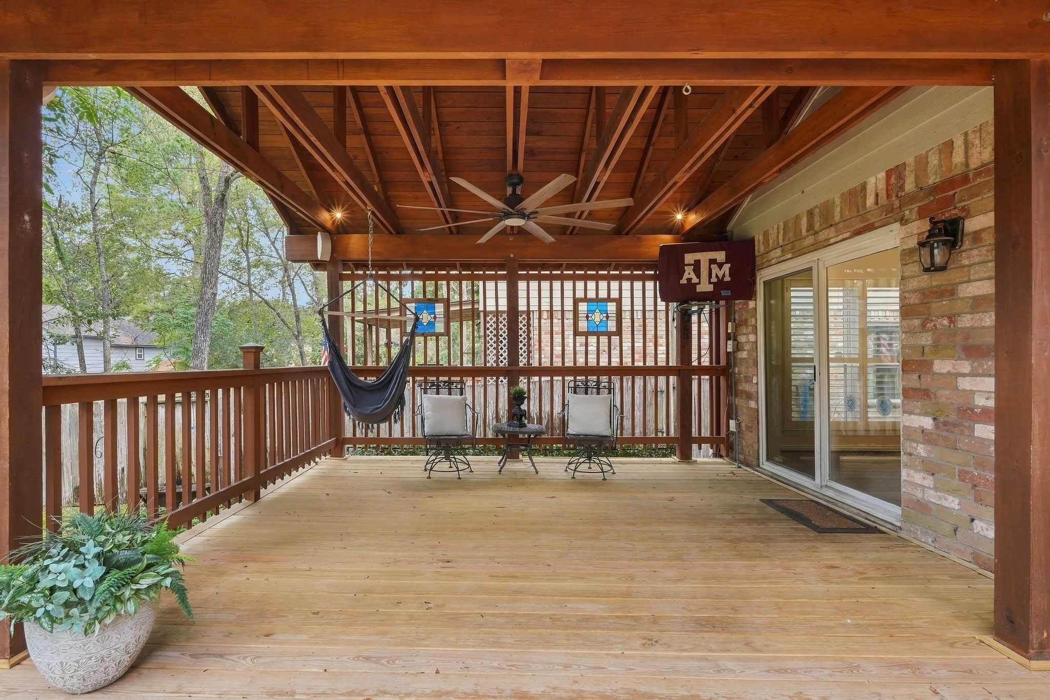 Another view of the covered patio. Relax, enjoy nature and watch the football games!