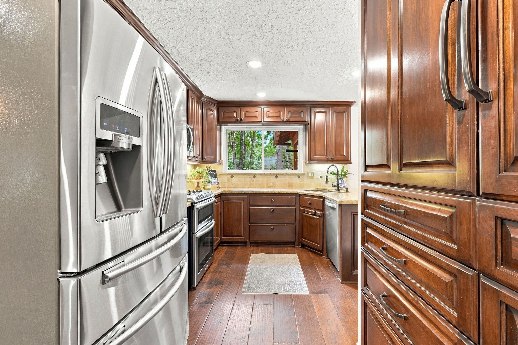 Kitchen with plenty of counter space and storage, making meal preparation and entertaining easy.