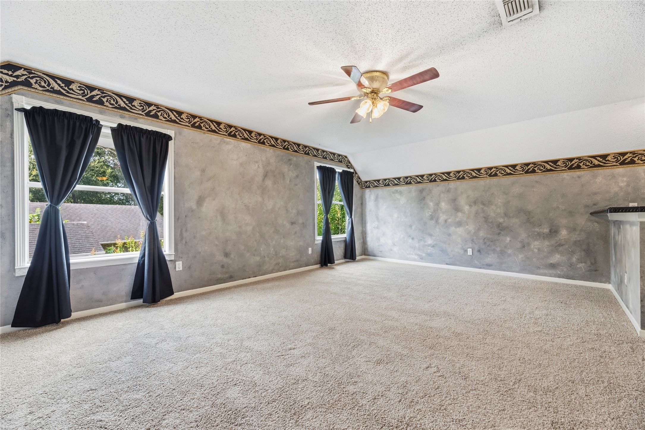Expansive game room space with a wet bar!