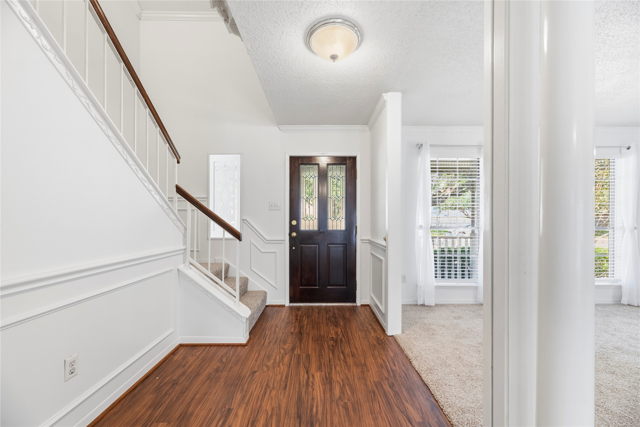 Welcome home! Fresh paint, brand new carpet, light and bright spaces!