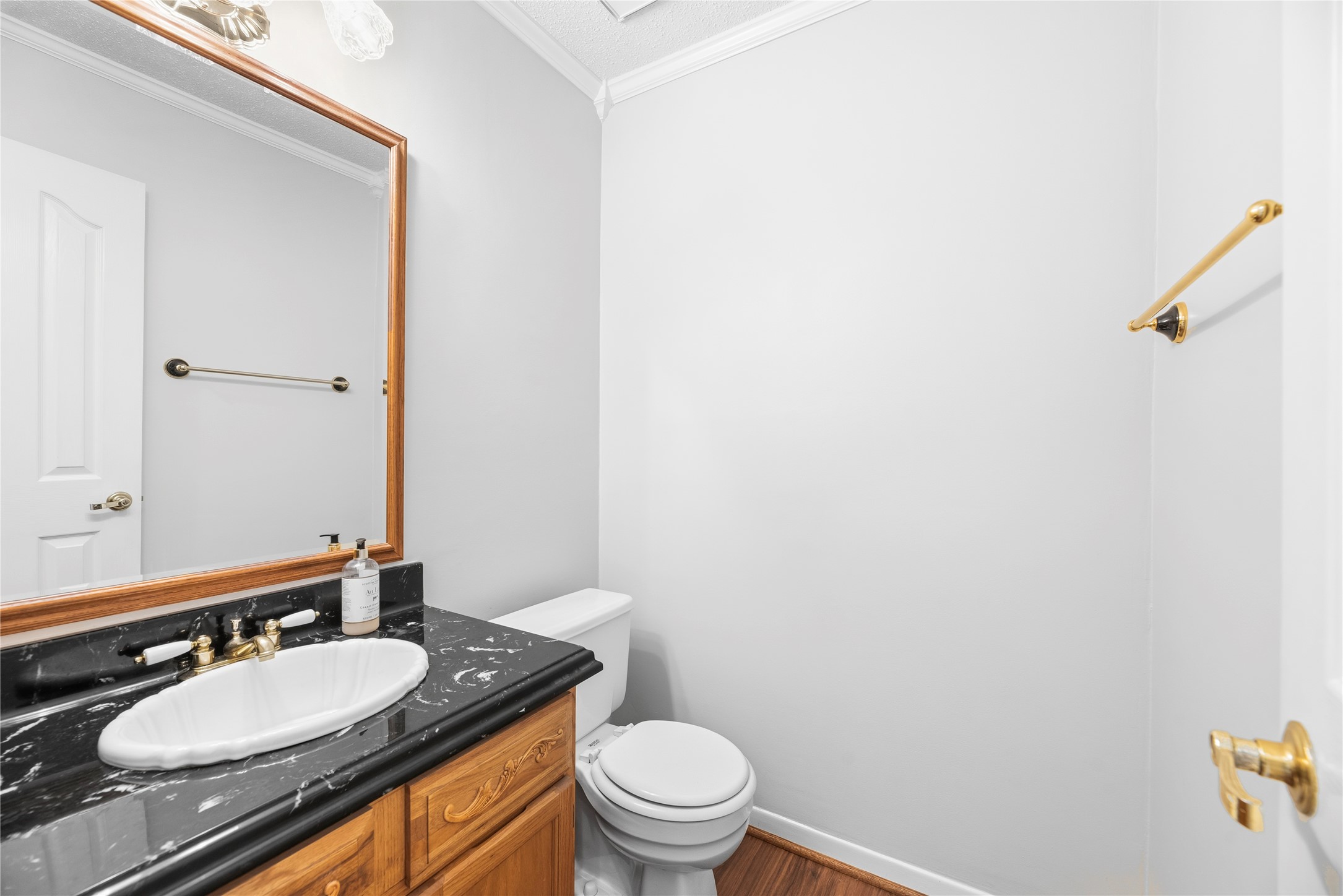 Half bath located downstairs for guests