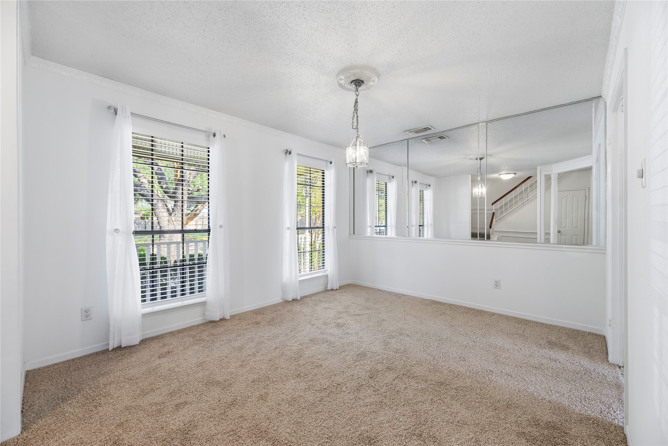Formal Dining room or bonus space located at the front of the home, with direct access to the kitchen.