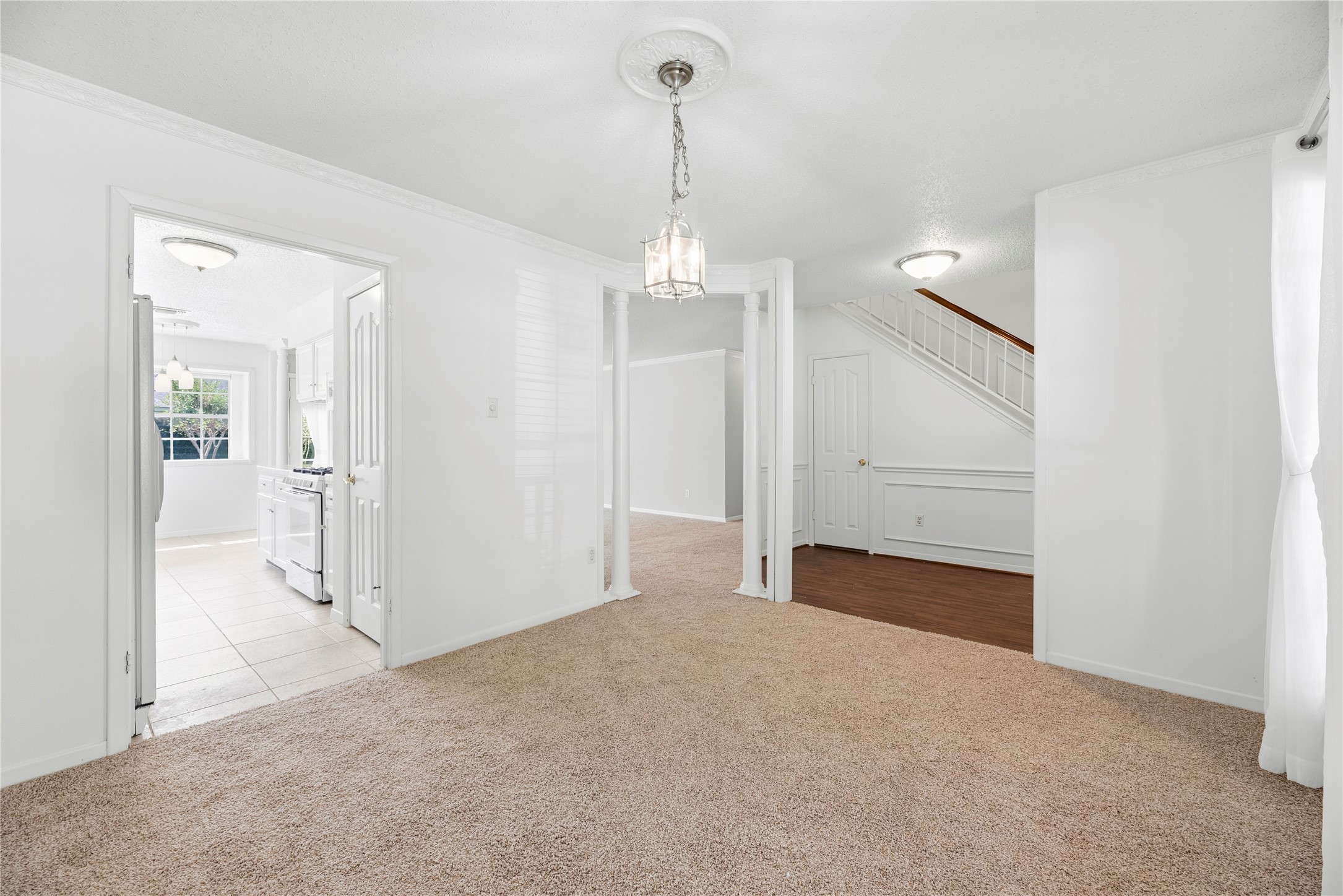 Formal Dining room or bonus space located at the front of the home, with direct access to the kitchen.