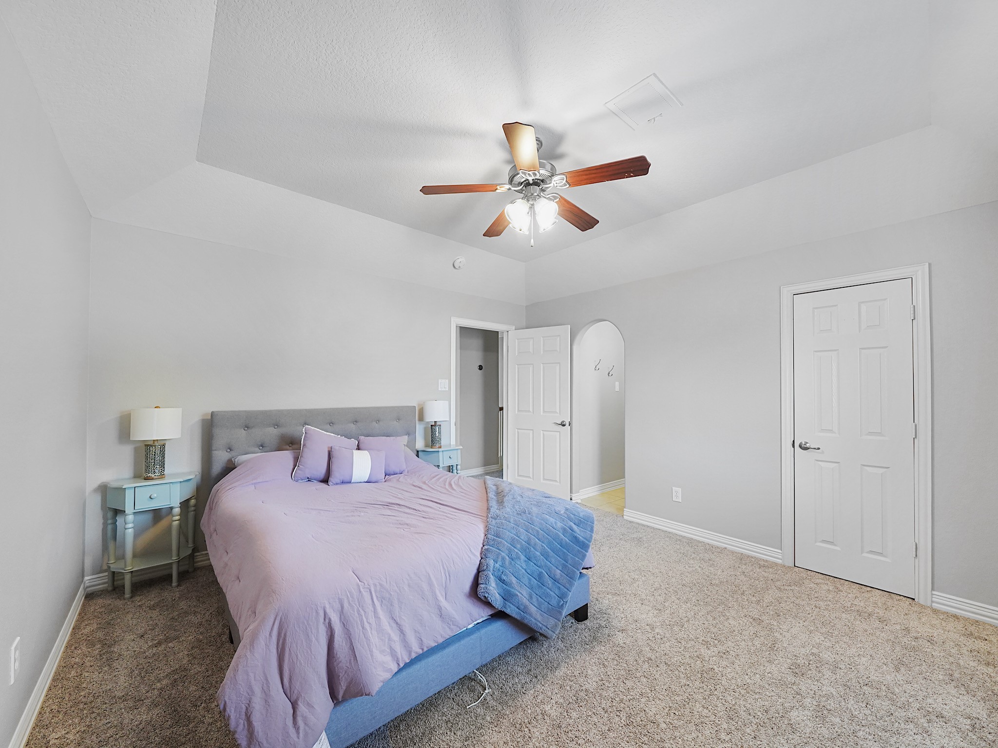Another spacious bedroom with walk-in closet storage, offering flexibility for family, guests, hobbies, or a home office.