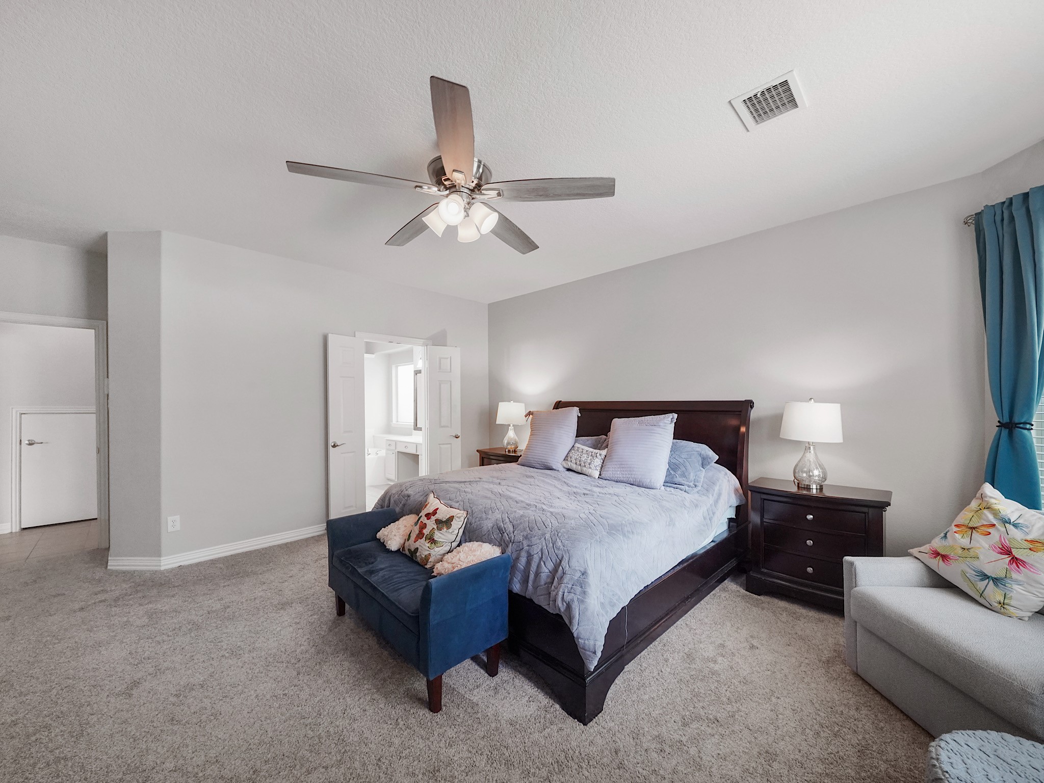 Generous proportions provide flexibility for a sitting area while creating a comfortable retreat at the end of the day.