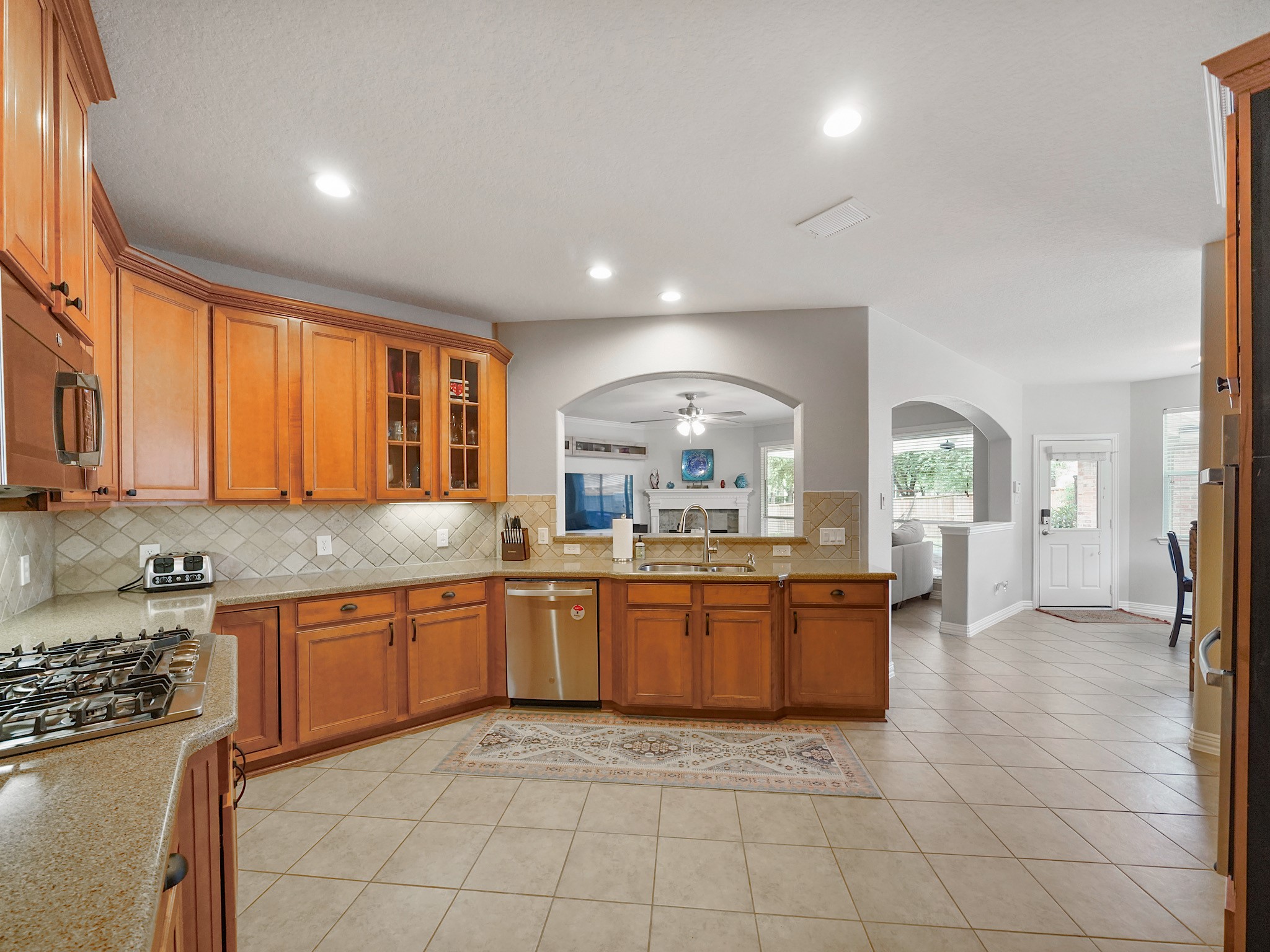 From meal preparation to entertaining, the generous layout and seamless connection to the living spaces make this kitchen the true heart of the home.
