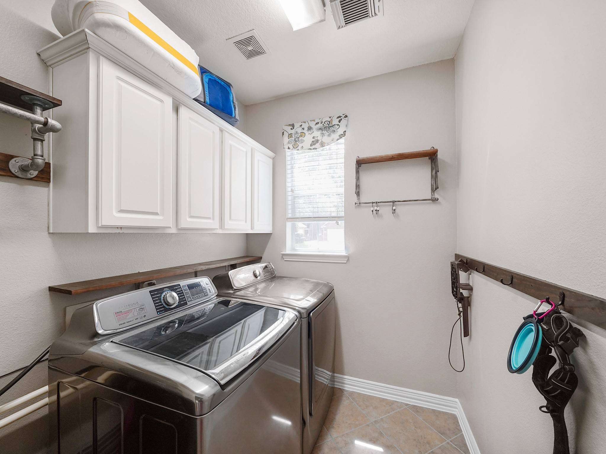 Thoughtfully designed with storage and functionality in mind, the utility room helps keep daily routines organized and efficient.