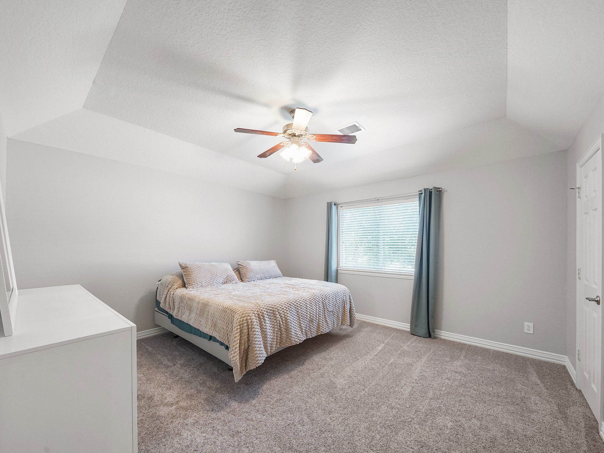 Spacious and a calming color palette create a comfortable retreat for family or overnight guests.