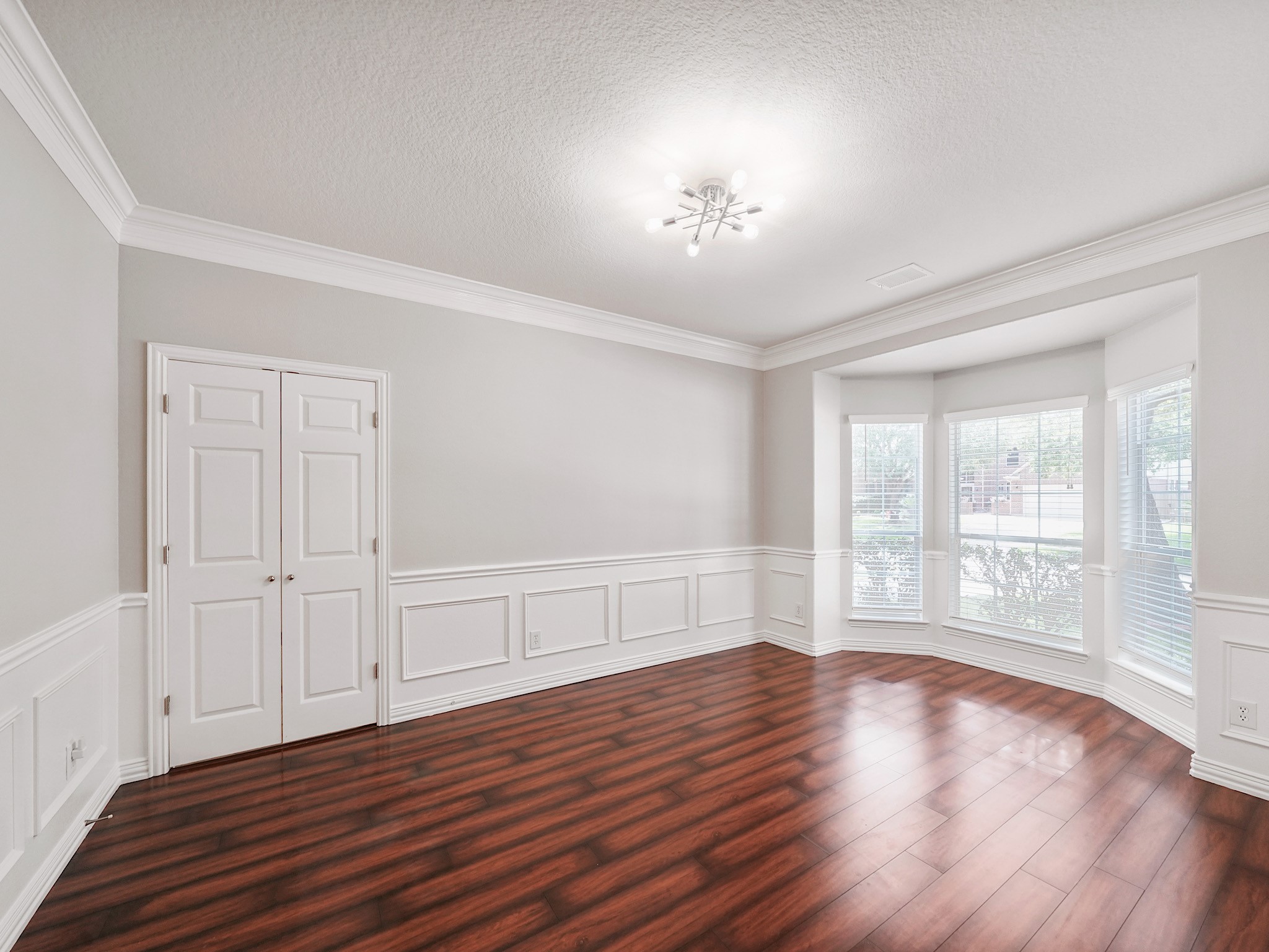 Detailed millwork and beautiful natural light create a timeless backdrop for memorable meals and special occasions.