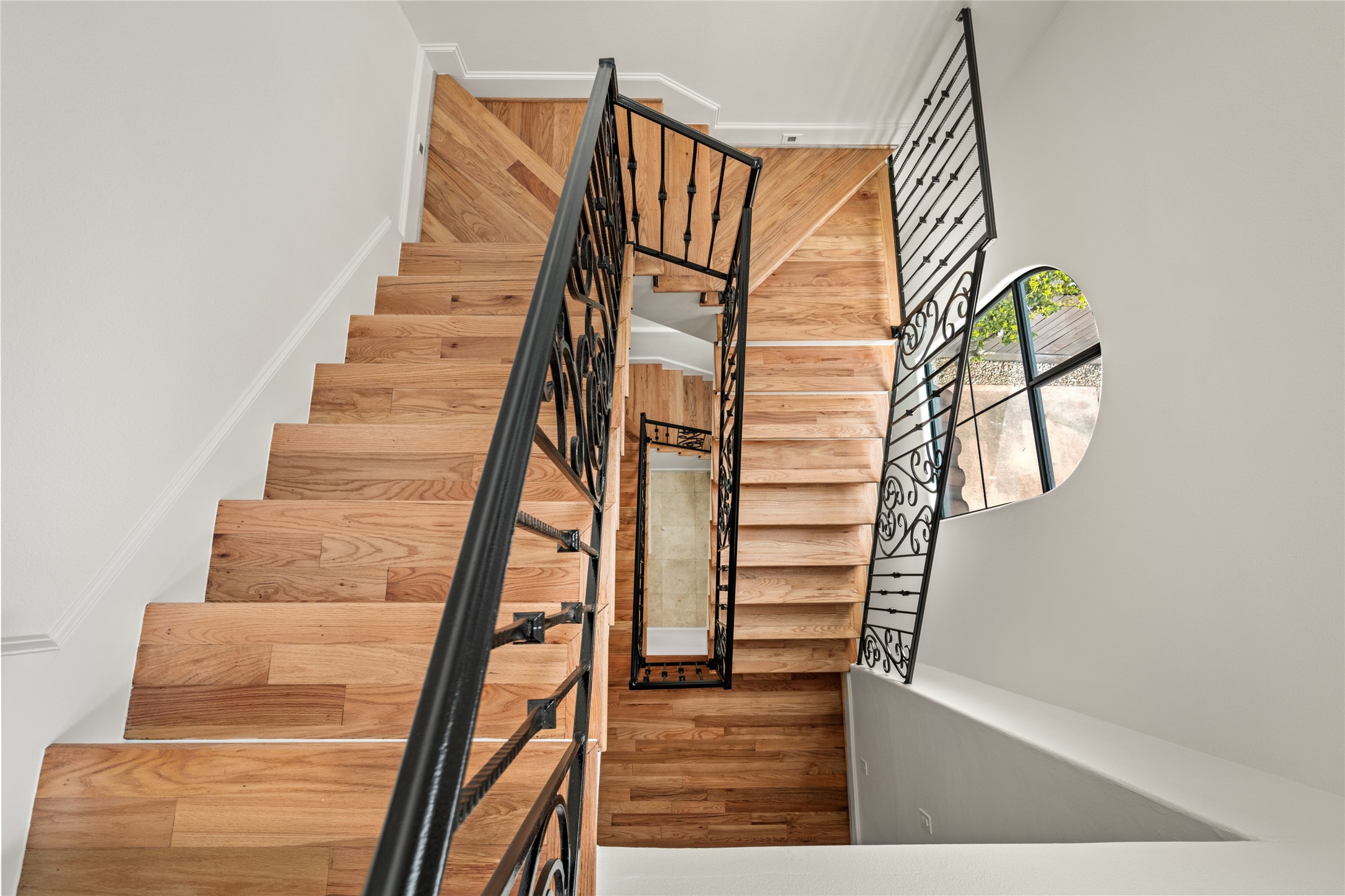 Grand staircase serving as a stunning focal point of the home.