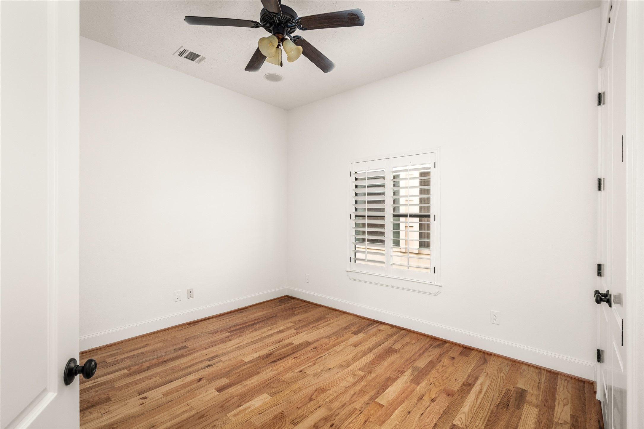 Second-floor bedroom with a full en-suite bathroom.