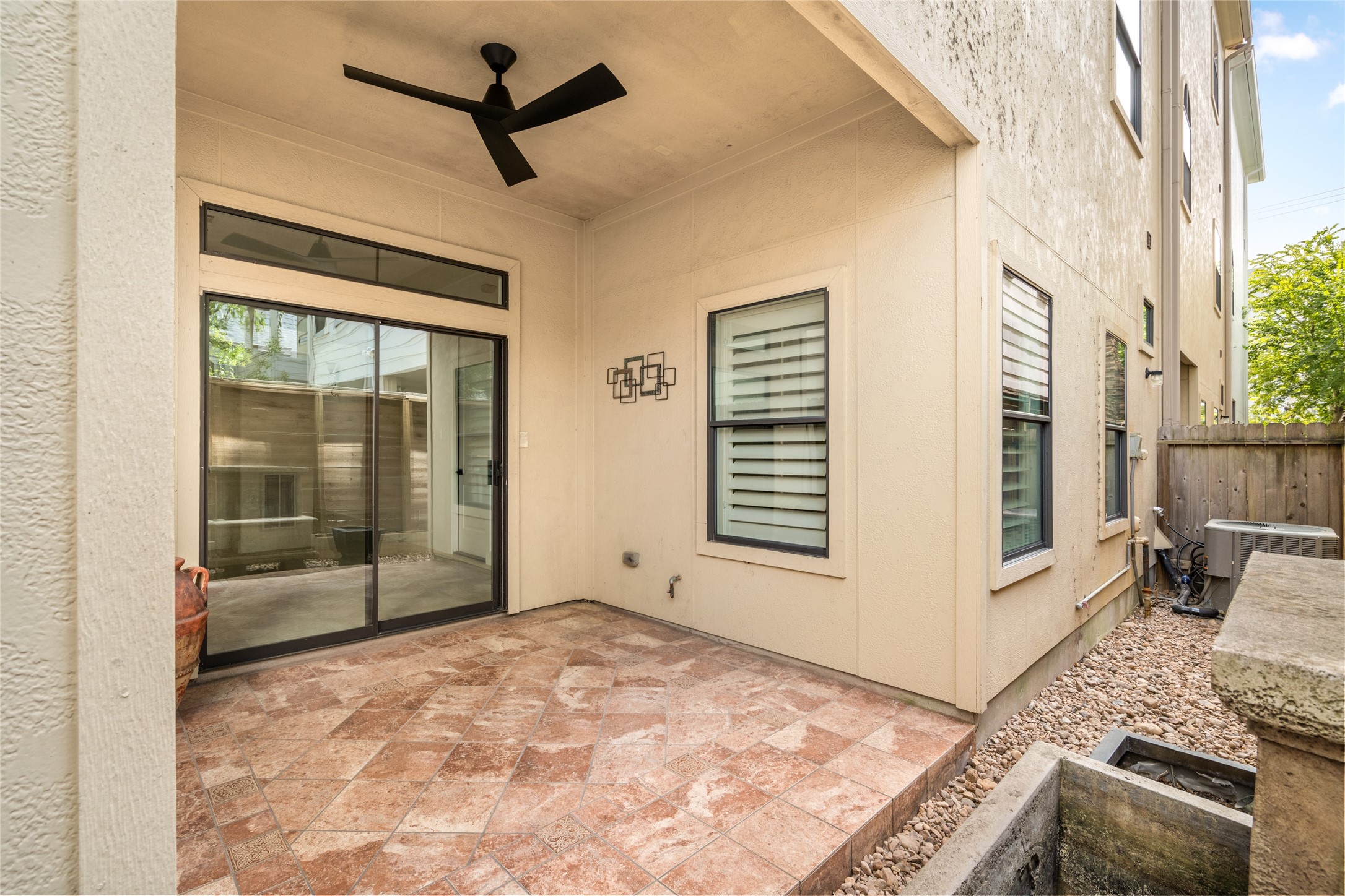 The first-floor patio has a new ceiling fan.