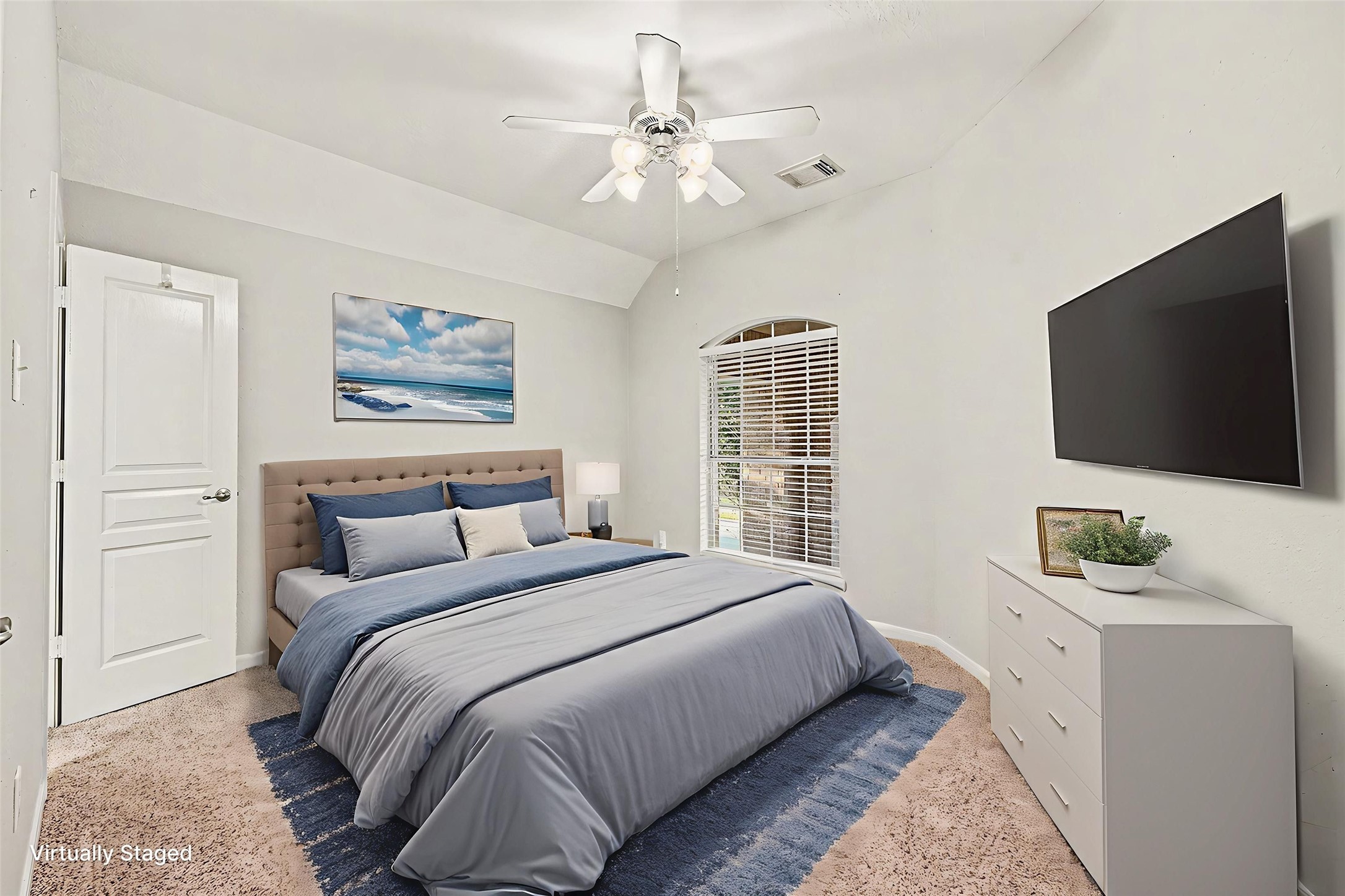 Virtually staged secondary bedroom.