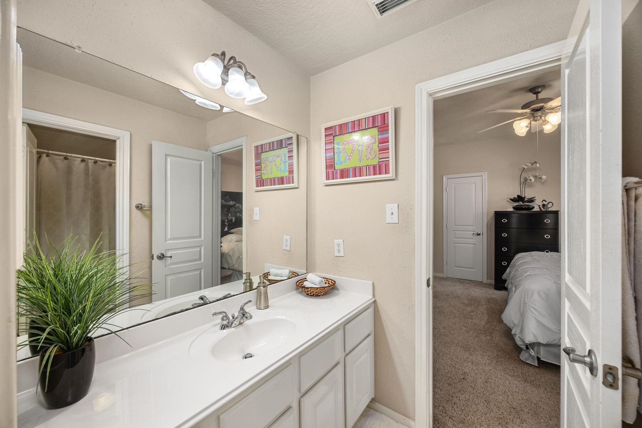 Check out this jack and jill bathroom shared by two connecting bedrooms upstairs.