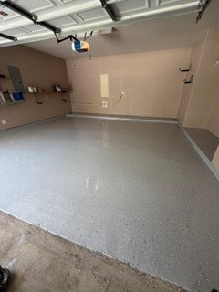 Garage painted with epoxy floor done in July 2026