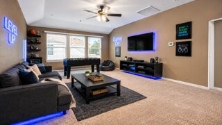 This gameroom is virtually staged.