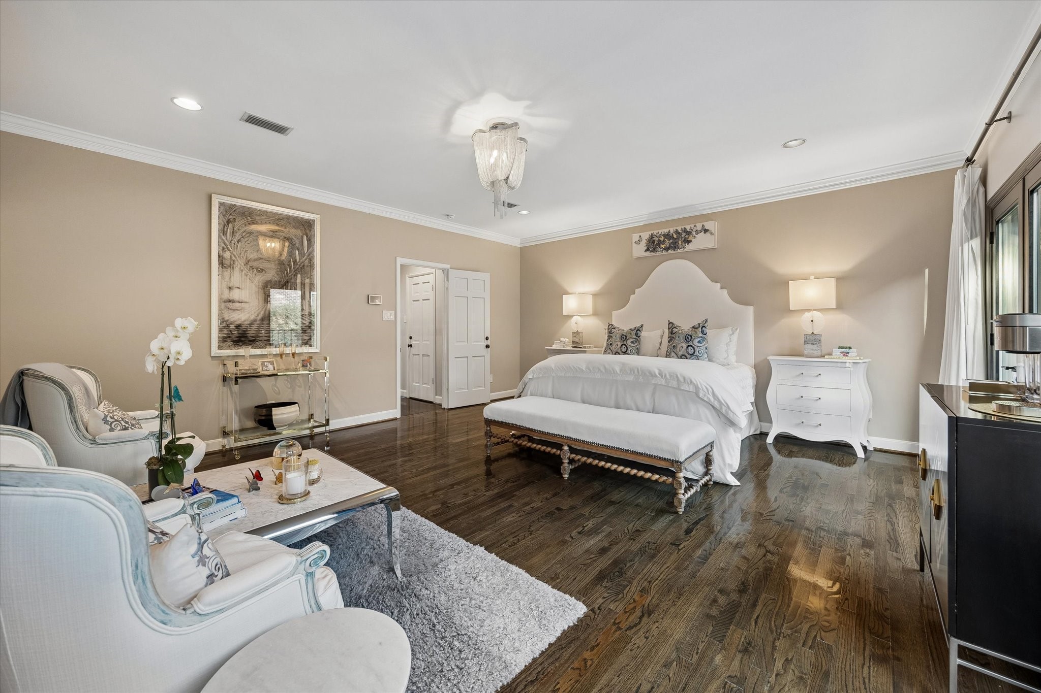 At the head of the upper Gallery is the Master Suite. Recent hardwood floors, warm colors and a generous amount of space combine to form the perfect Suite.