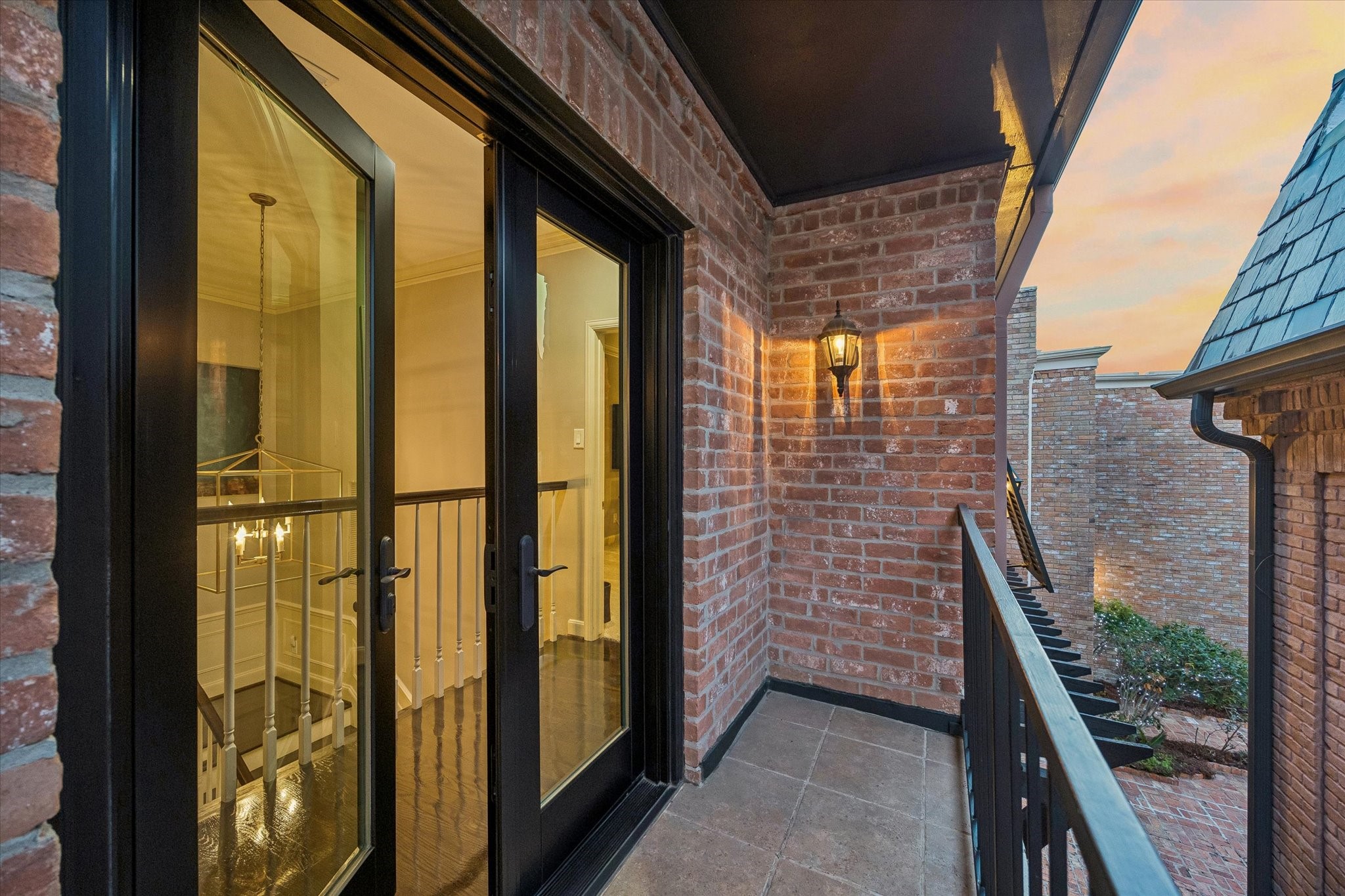 ...is another set of French doors and a shaded Balcony.