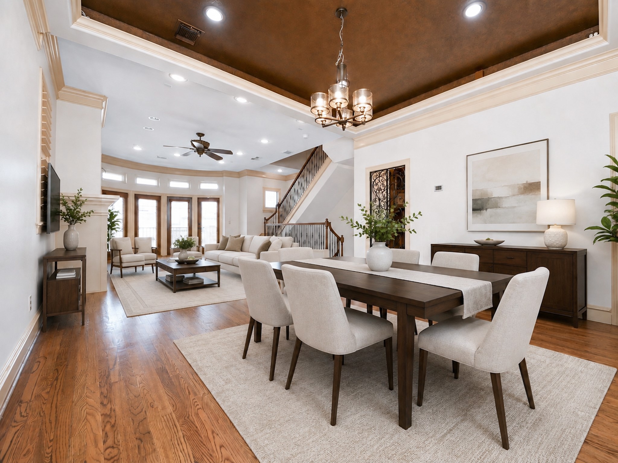 Virtually staged view of Dining room to Living room facing the second floor patio