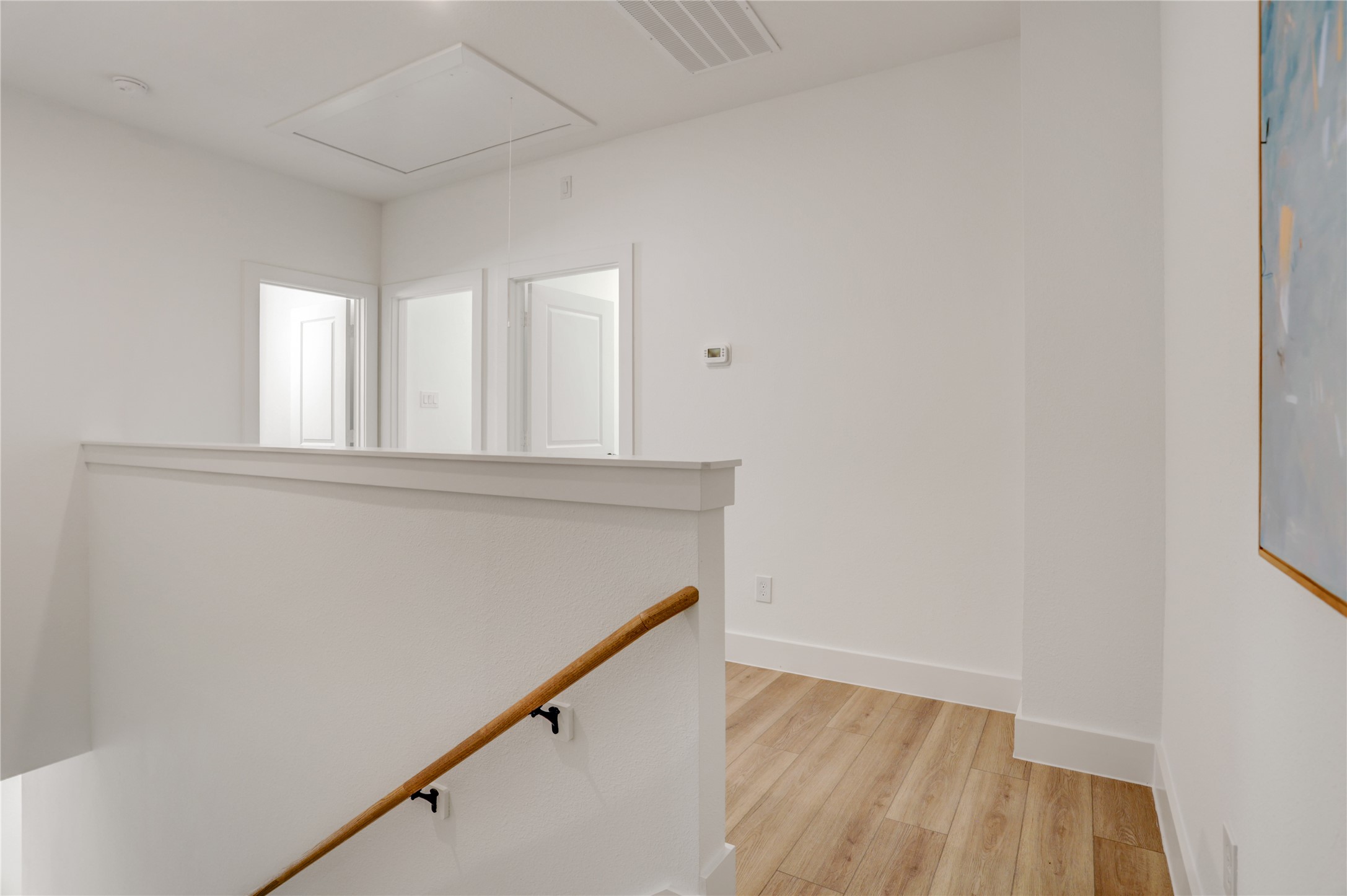 Stone Polymer Composite flooring across the house is scratch and water resistant and pet friendly.