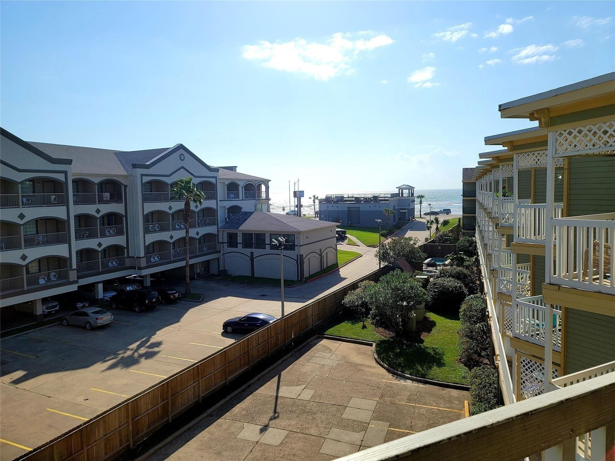 Balcony view off of living room allows for majestic ocean view as well as view of the hot tub area