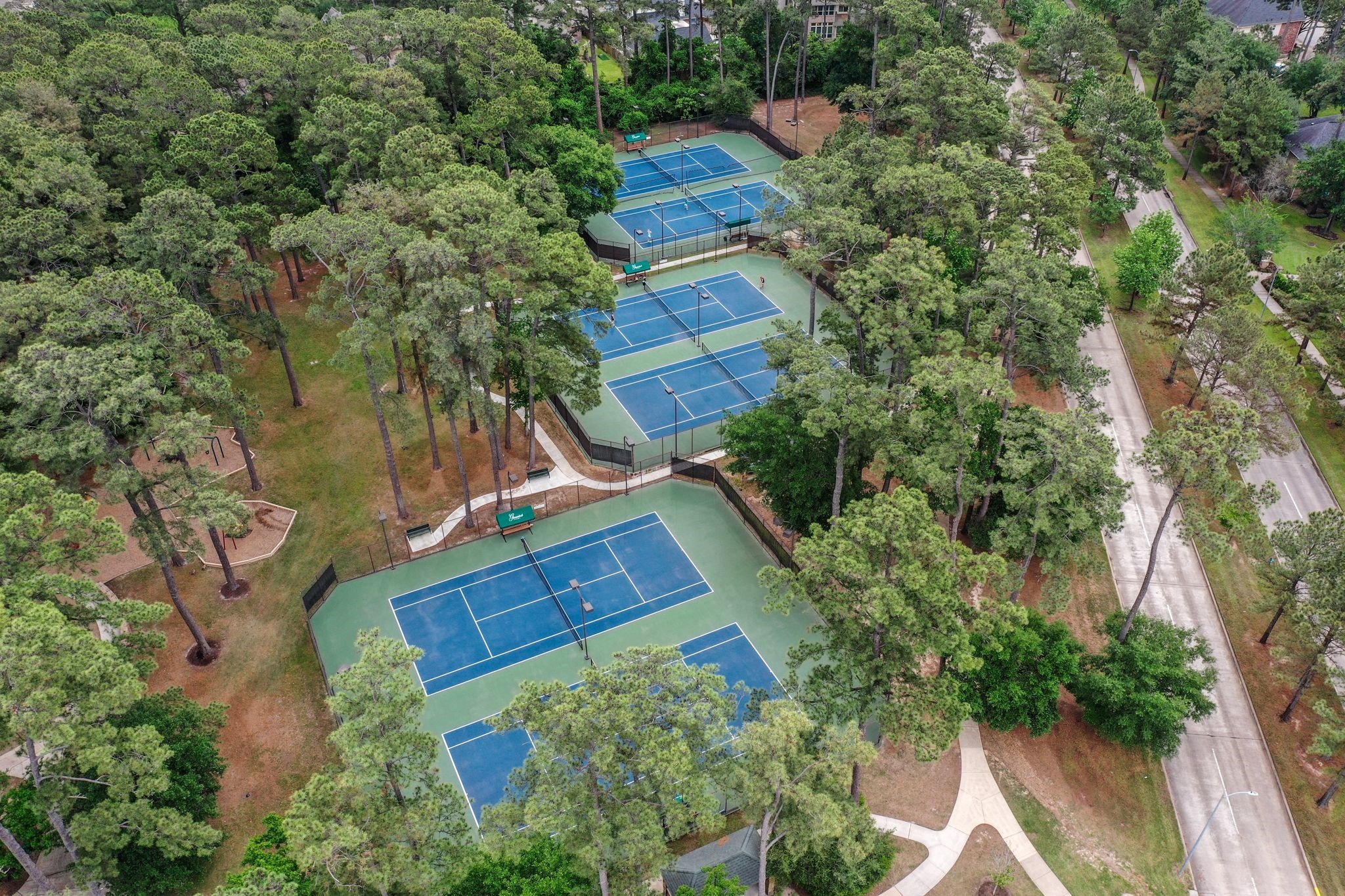 TENNIS COURTS, the community is home to multiple tennis leagues which enjoy 6-fully lighted tennis courts as well as a covered Pavilion.