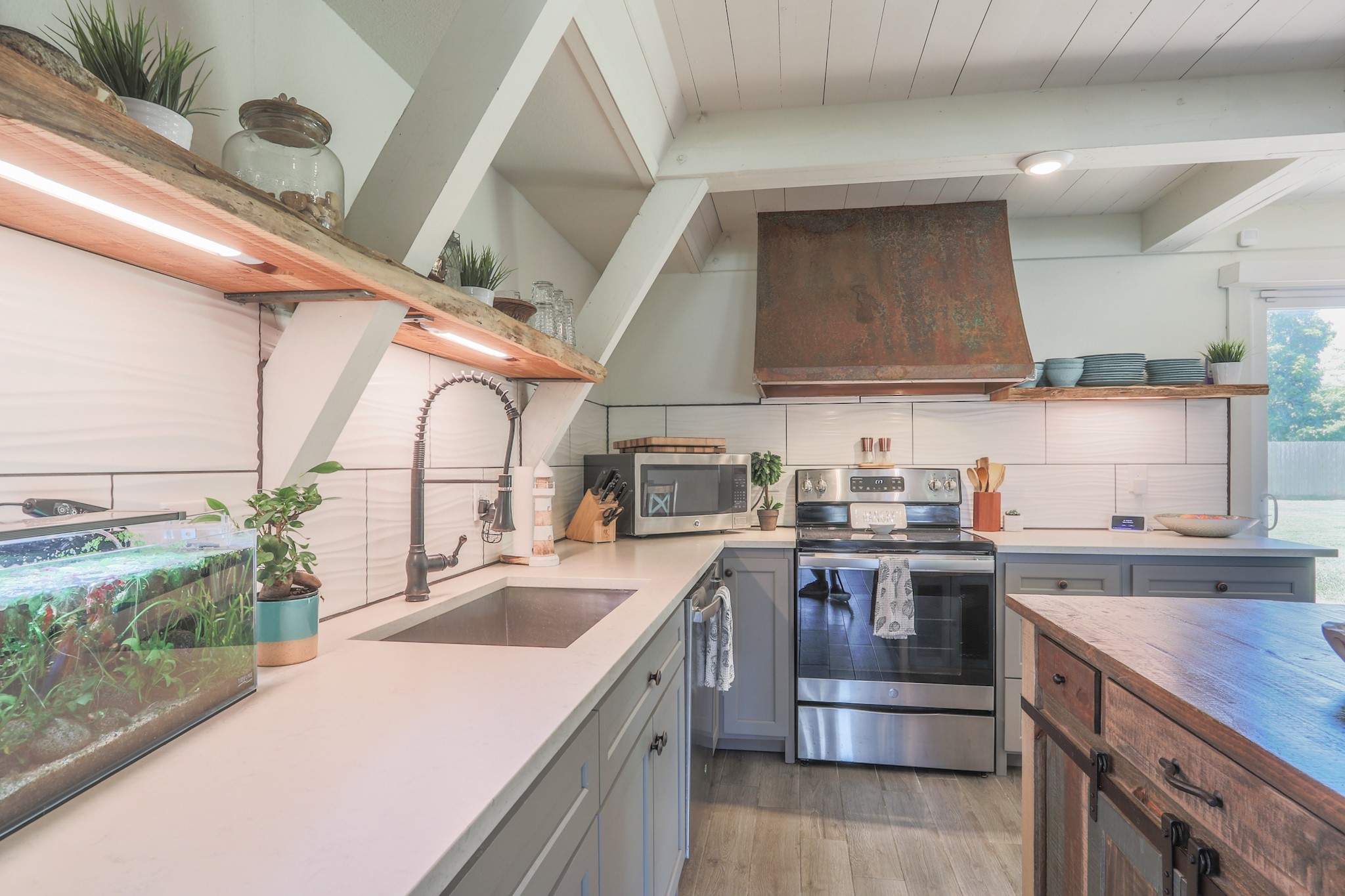 Such a practical and charming space to prepare meals - as they say - "The kitchen is the Heart of the Home" - 
You will enjoy the warmth and joy this home exudes...