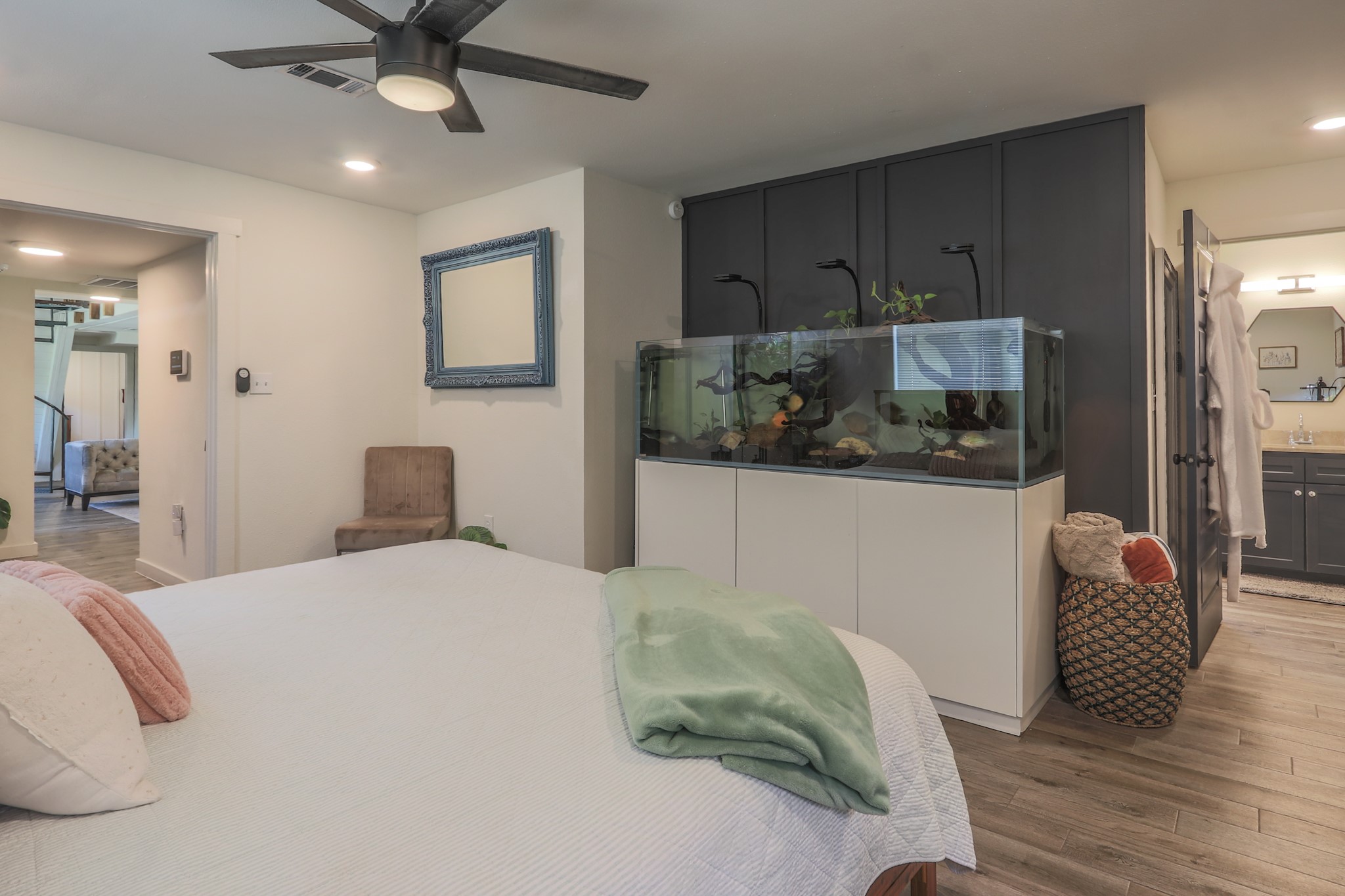 A better view of aquarium and the entrance to the primary suite bath.