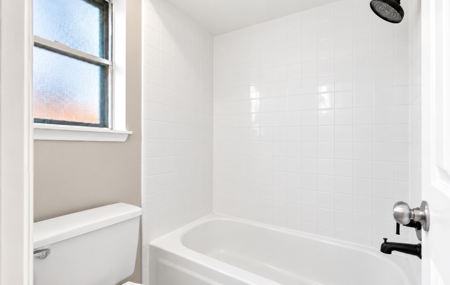 The primary bathroom has a tub/shower combo!