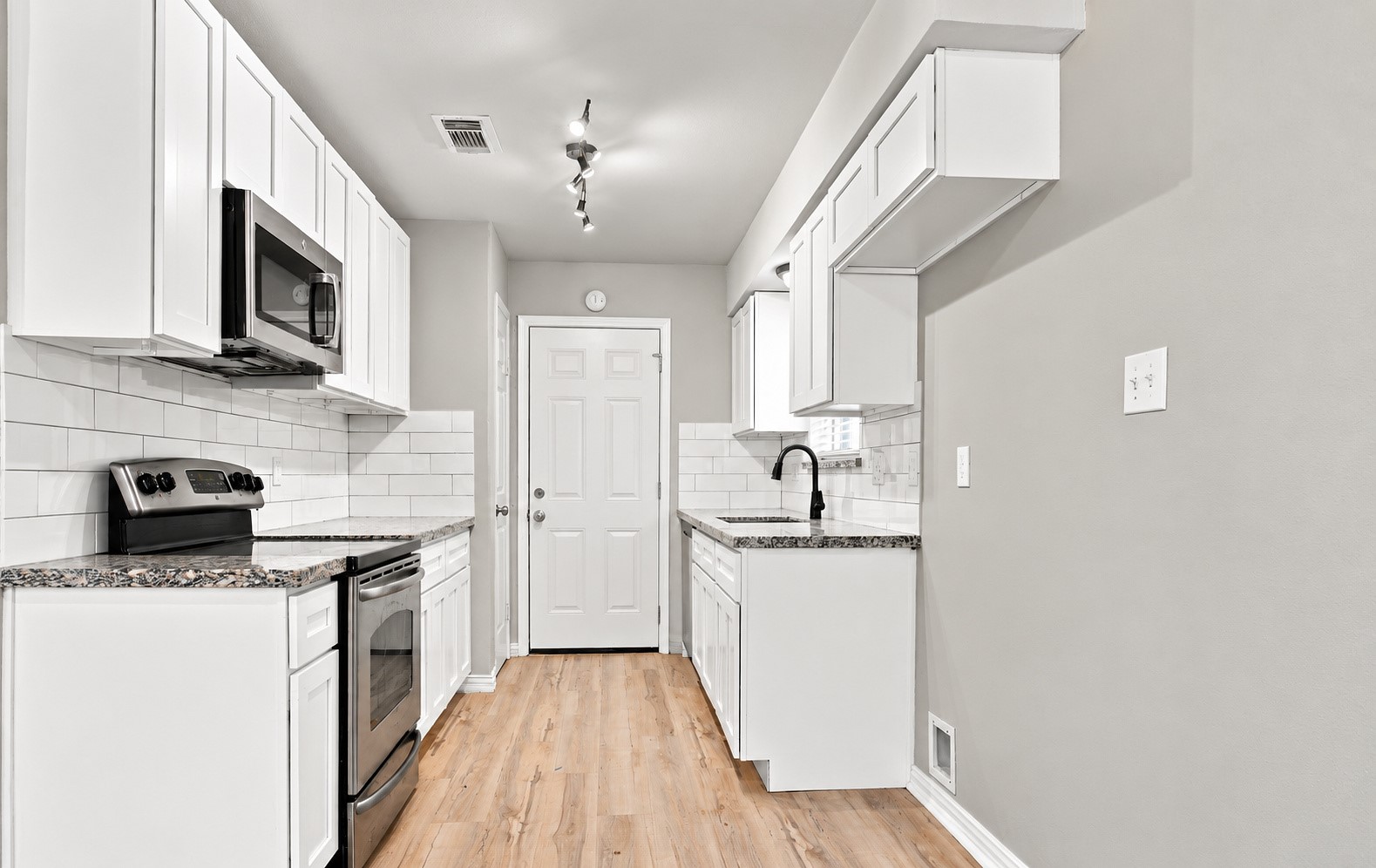 The updated kitchen with BRAND NEW CABINETS! The updated kitchen with BRAND NEW CABINETS!