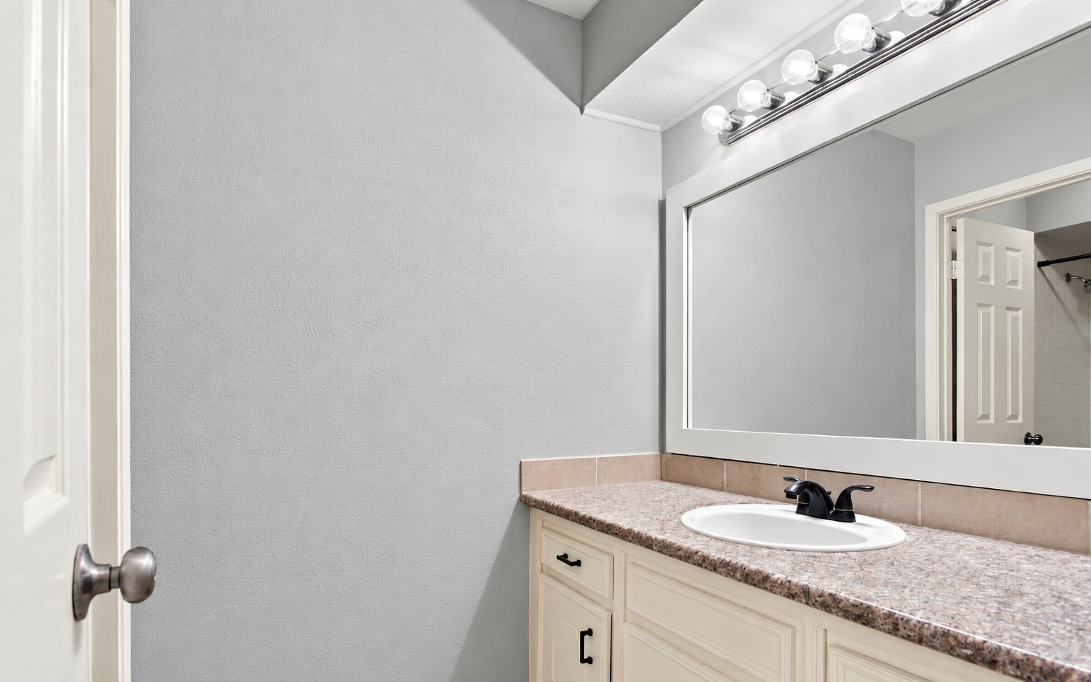 Another angle of the vanity in the secondary bathroom!