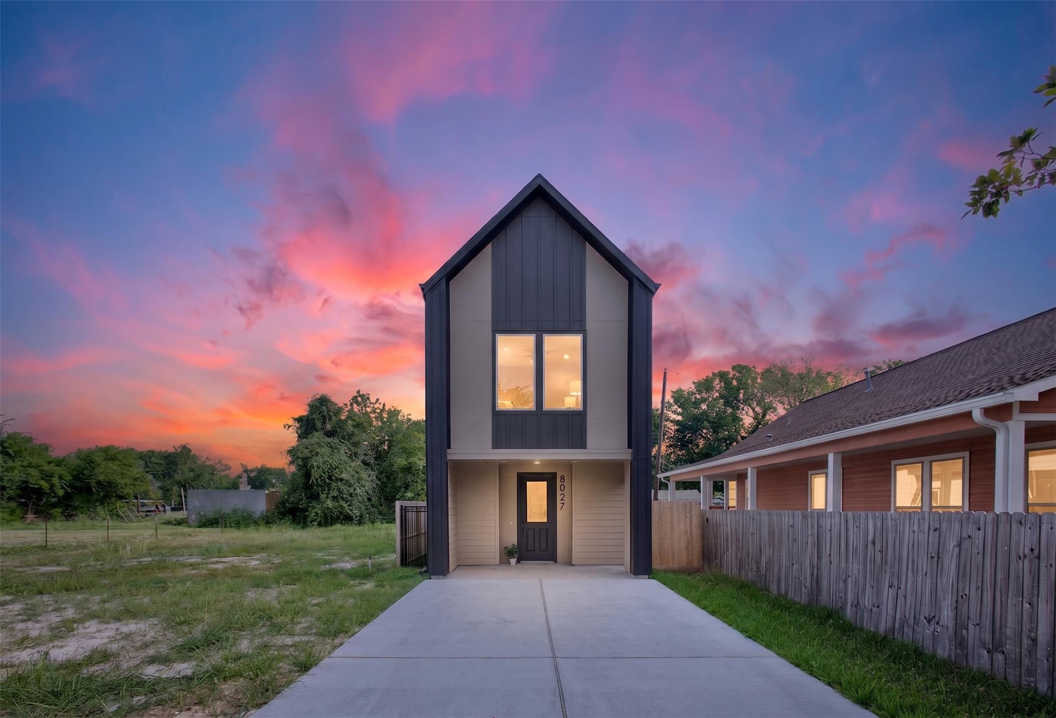 Discover modern living in this sleek, move-in ready home featuring a spacious, private backyard perfect for relaxation and entertaining.