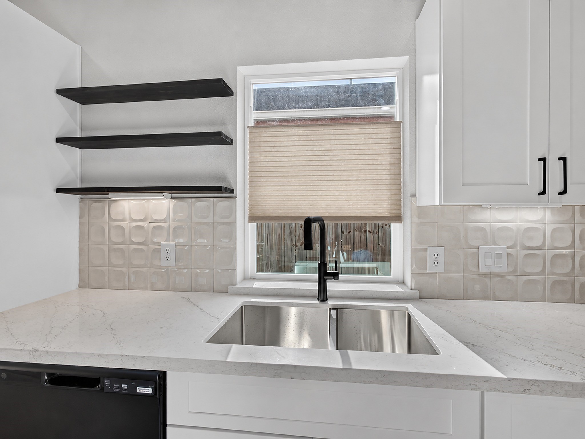 Designer floating shelving and backsplash