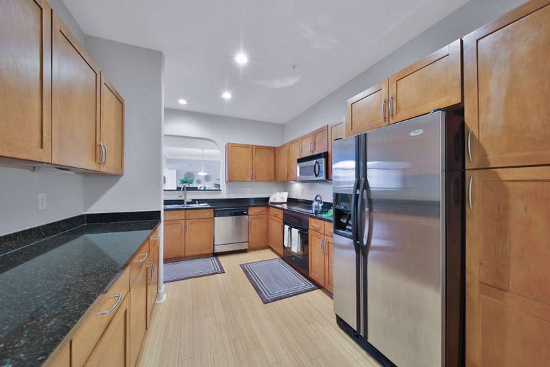 The view of kitchen W/Ample countertops and cabinetries.