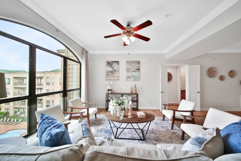 The other view of living W/Stunning crystal pool views.