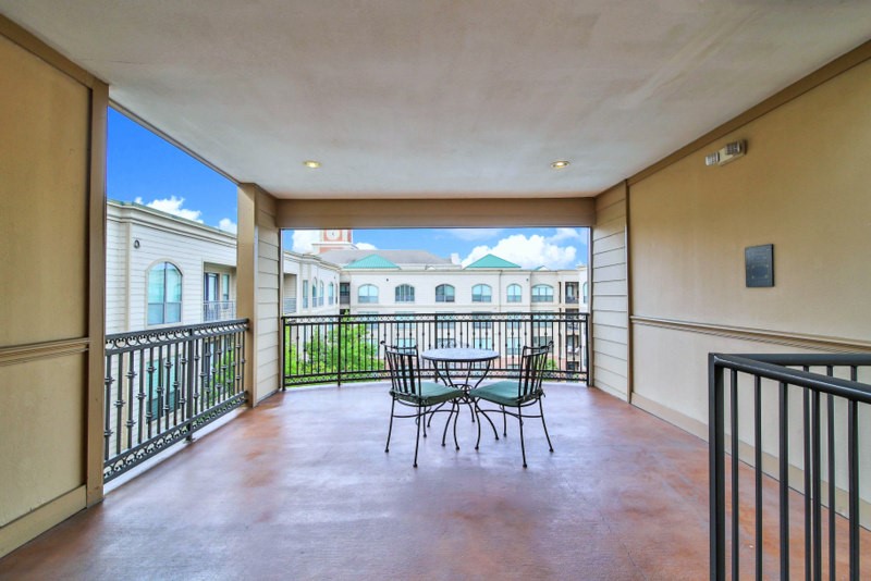 Extended balcony W/Courtyard and pool views is adacent to unit 406,