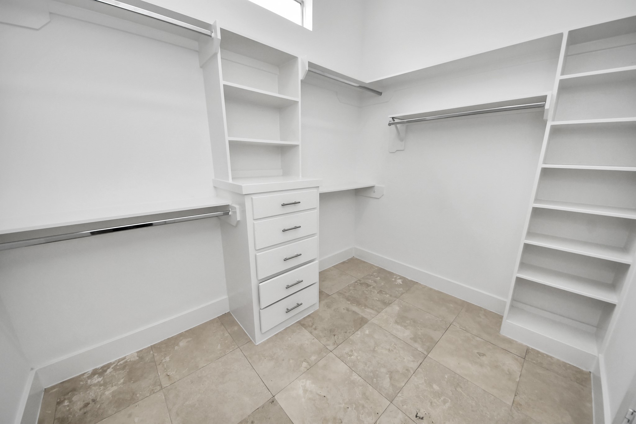 First-floor bedroom with a private full bathroom, ideal for guests.