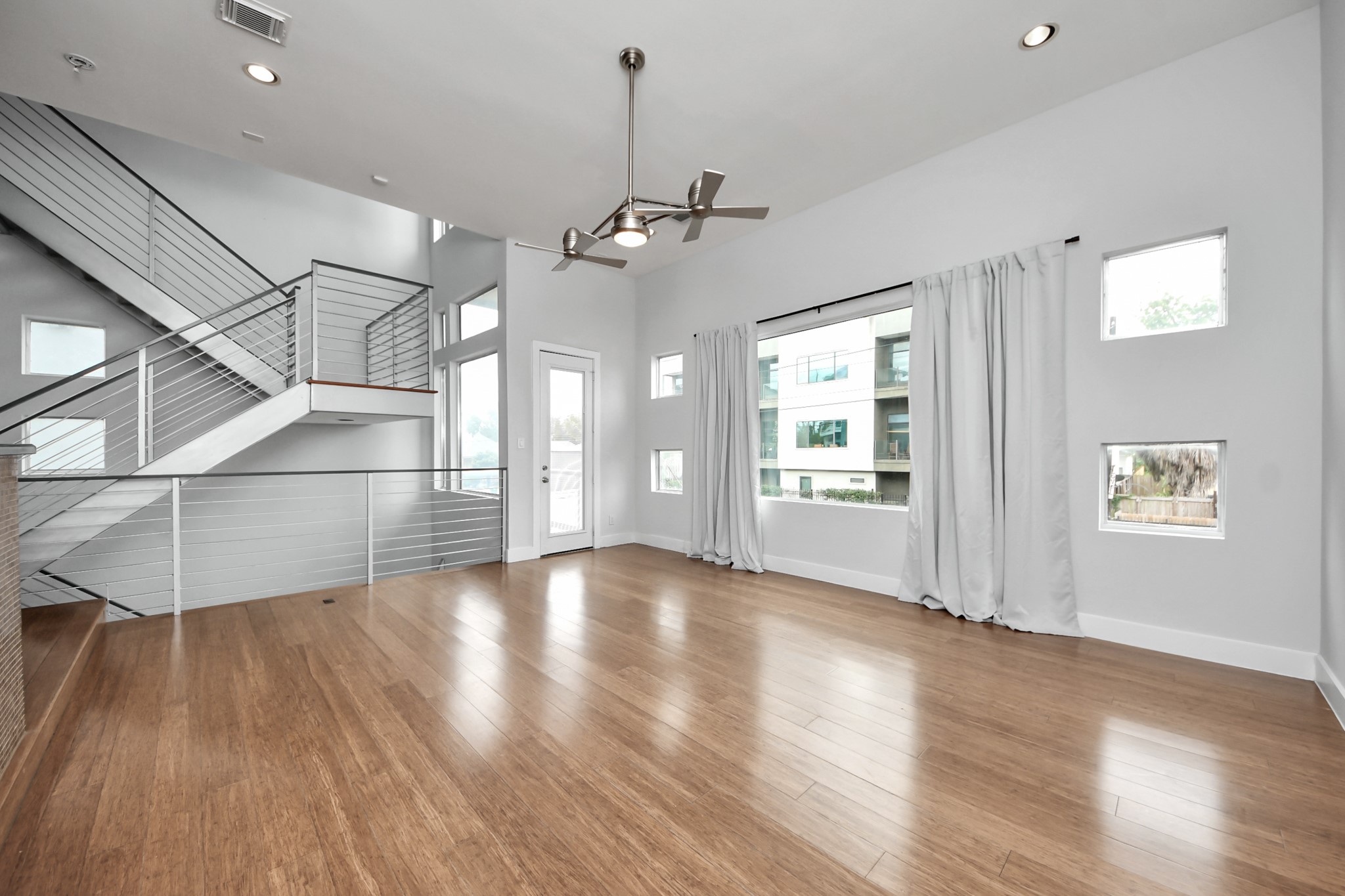 Living room area with open floor plan and great natural lighting