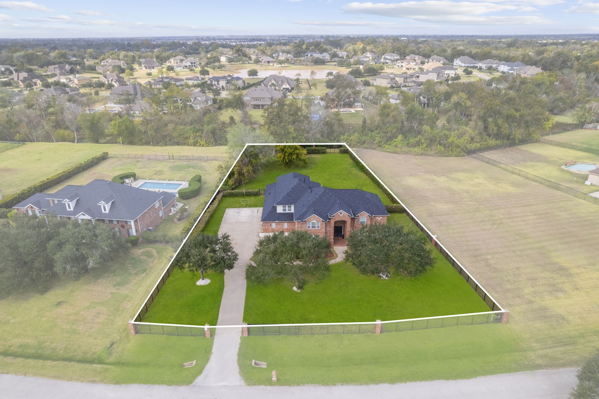 Expansive lot offering endless possibilities. Space to play. Space to escape. Space to grow.