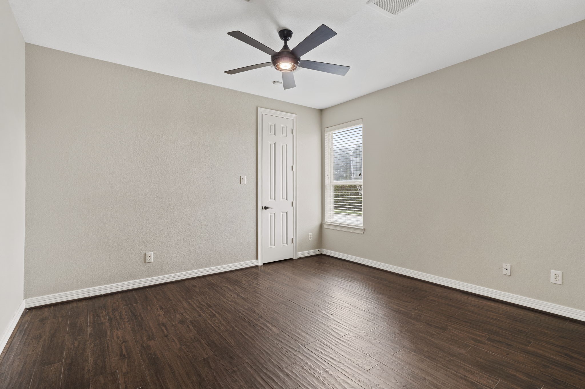 Additional secondary bedroom and full bathroom on the main level, offering comfort and convenience for guests or multigenerational living.